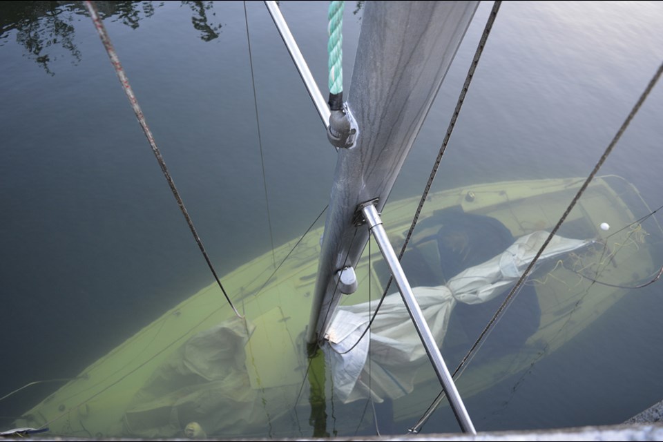 A photo taken on Jan. 7 shows a sunken sailboat right by Darrell Bay ferry terminal. The vessel sank after a windstorm swept through town on Dec. 20. Steen Larsen, the owner, previously said he intended to lift it out before New Year's.