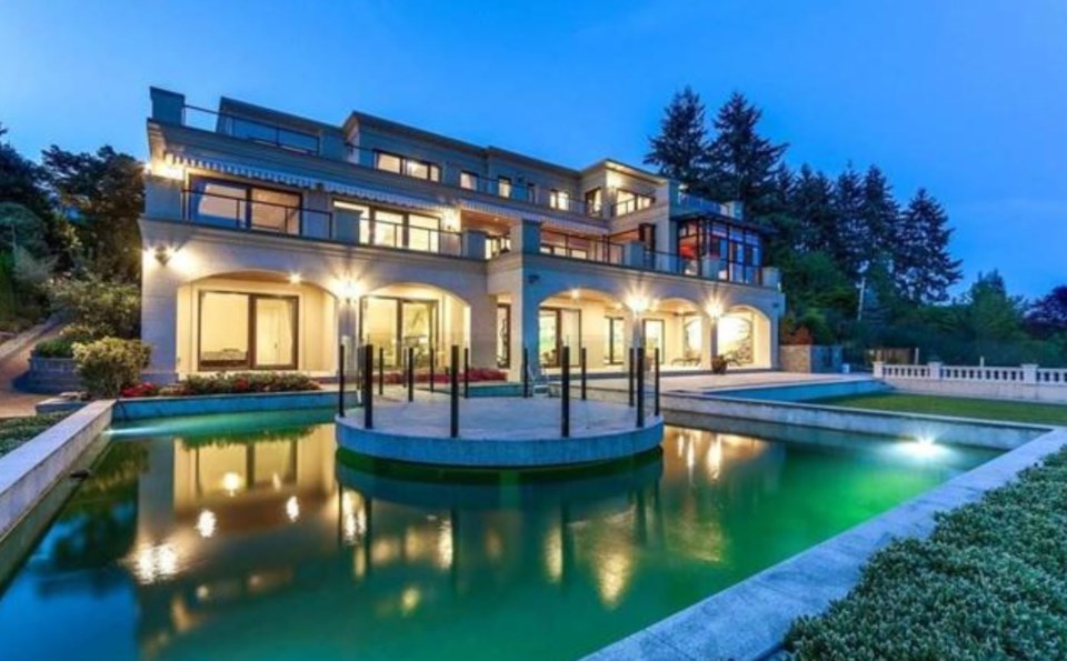 $18-6m West Van mansion pond terrace