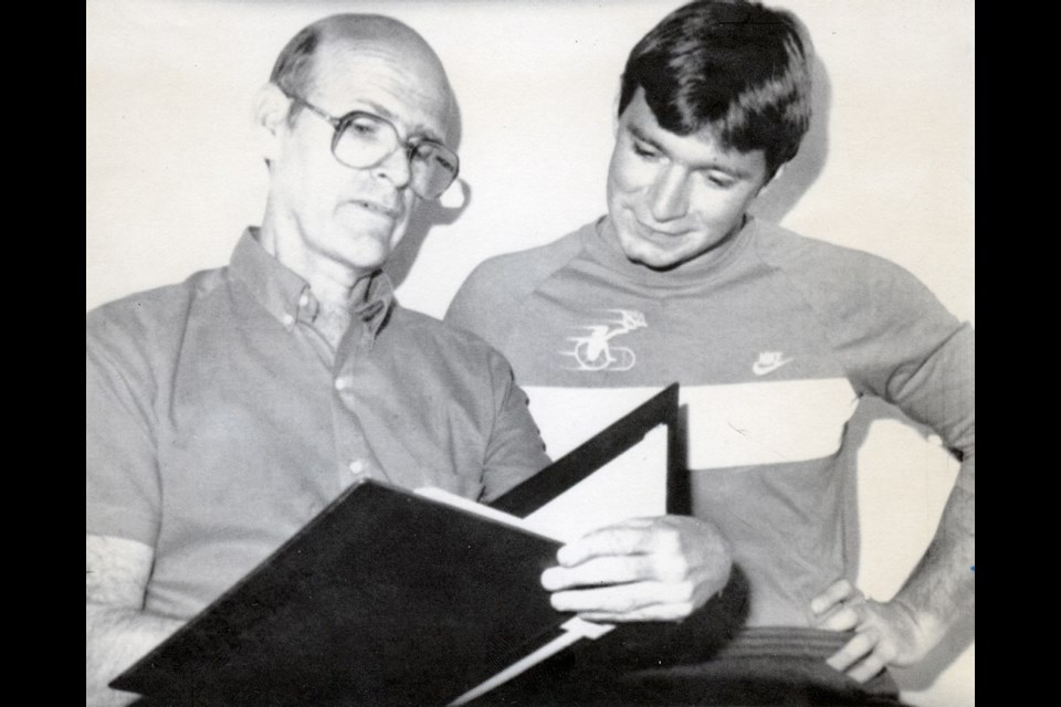 Sept. 15, 1987: Jim Taylor with Rick Hansen. They wrote a book about Hansen&Otilde;s life, including the Man in Motion world tour in which Hansen circled the globe in a wheelchair.