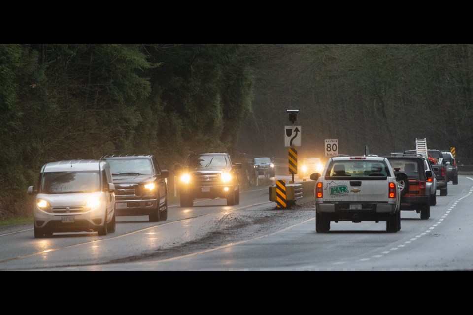 Drivers navigate a damp stretch of the Malahat near Goldstream Provincial Park. The segment of the Trans-Canada Highway has long frustrated motorists delayed for hours by accident-caused shutdowns.