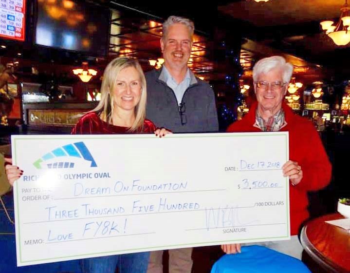 The Forever Young 8K Walk/Run event for 55+ held at the Richmond Olympic Oval raised over $4,000 for the Dream-On Seniors Wish Foundation, which helps seniors in need. (From left) Nicola More, of the Dream-On Foundation; Warren Purchase, Oval event manager and John Young, of Forever Young.