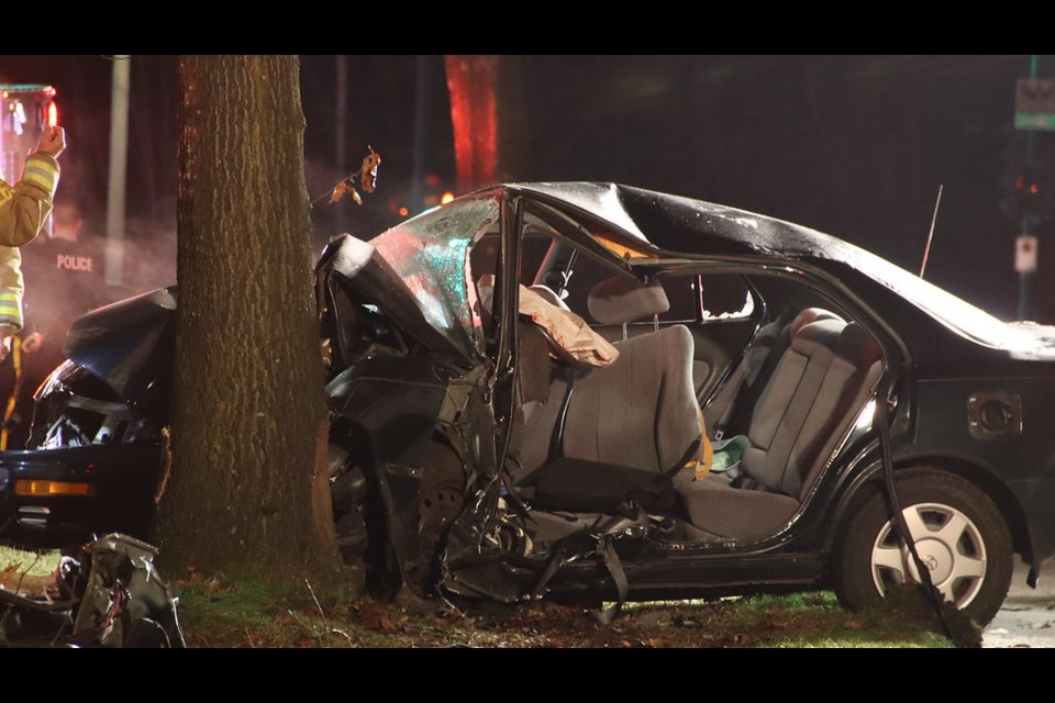 Burnaby firefighters worked to extract a driver from a single-vehicle crash. ALL PHOTOS BY SHANE MACKICHAN