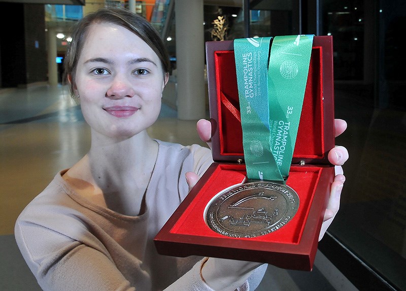 Coquitlam trampoline gymnast Tamara O'Brien shows off the bronze medal she received at the 33rd world trampoline gymnastics championships in Saint Petersburgh, Russia. Even though she wasn't able to compete because of a cancer diagnosis in 2017, the Canadian team presented her with the medal it won in the team competition when she was able to travel to the meet with the help of a new foundation that provides life experiences to young adults facing a difficult health challenge.