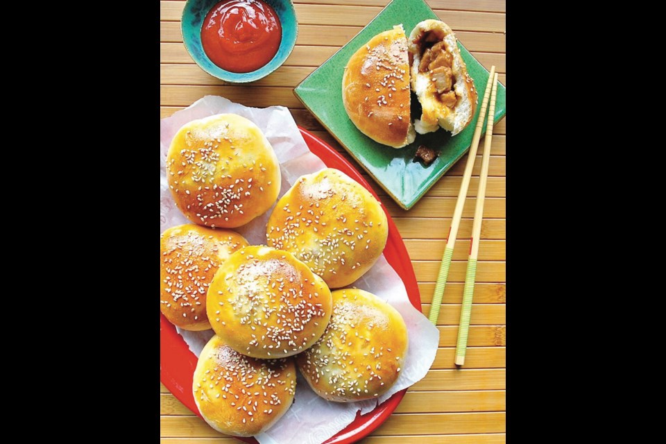 Chinese-Style Barbecue Pork Buns are golden, tender buns filled with chopped bits of succulent and saucy barbecue pork.