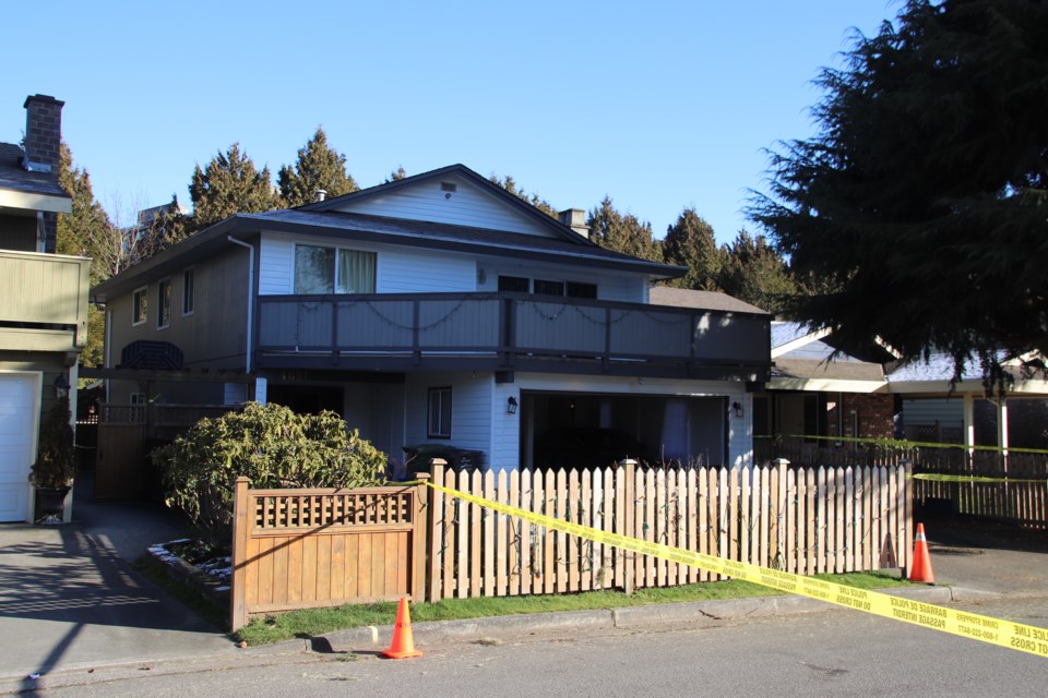 Police found a dead man and a drug lab in this home at the corner of Princeton Avenue and Palmer Road. Photo: Shane MacKichan