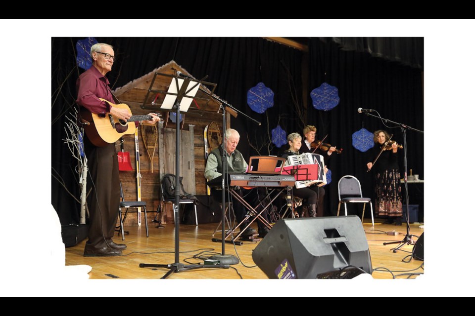 The Old Time Fiddlers perform at St. Mary's Hall on Saturday morning as part of the 34th FrancoFun Winter Festival Sugar Shack brunch.