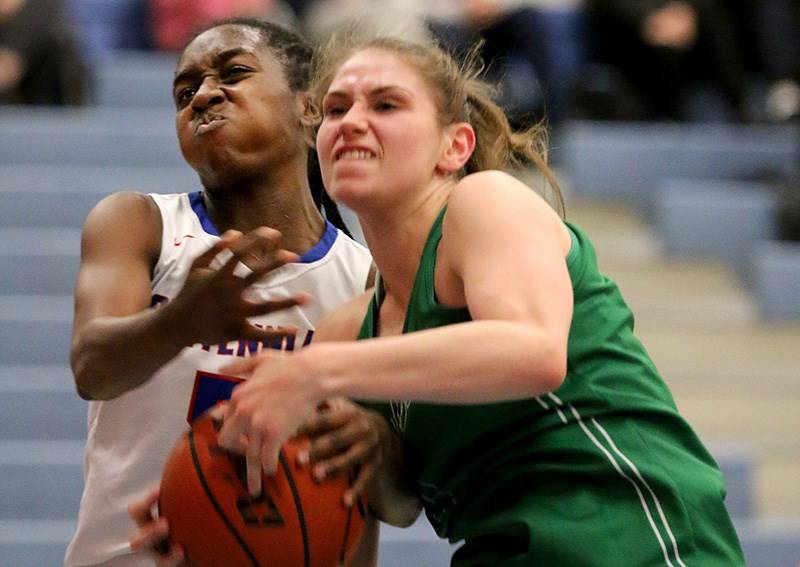 Jessica Parker drives hard to the net in Riverside's last regular season game against Centennial secondary last Wednesday. The senior had a breakout season to lead the Rapids to eight wins and no losses in league play. The team is ranked third in the Fraser Valley heading into the regional championship that begins today.