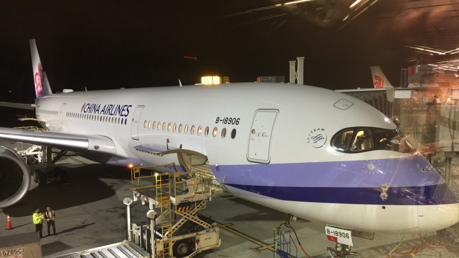 A China Airlines plane waits at a gate at Vancouver International Airport. Photo Glen Korstrom