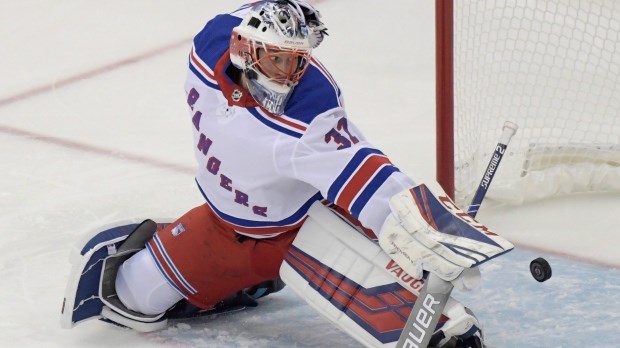 Marek Mazanec makes a save for the New York Rangers.