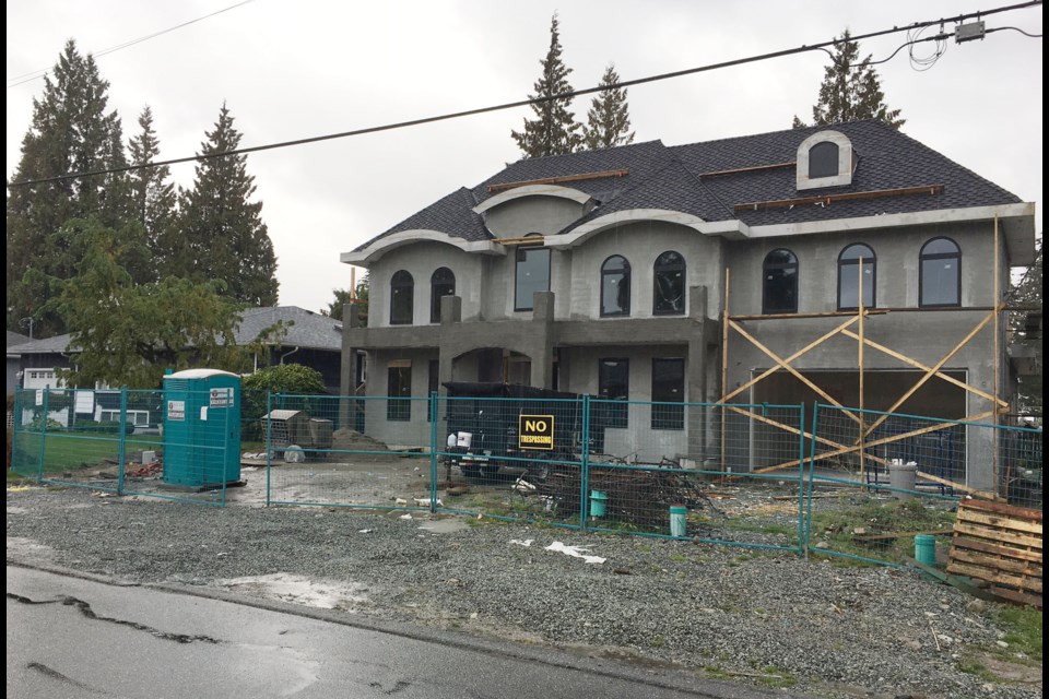 A large home under construction in southwest Coquitlam that would not be allowed under new regulations being proposed to limit the size of homes in the area to 5,500 square feet.