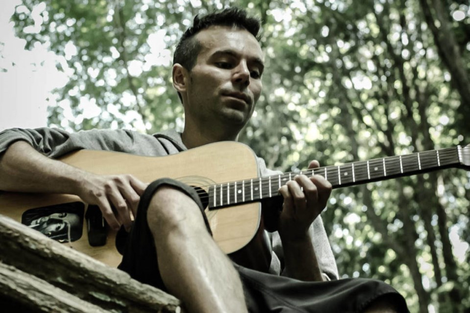 Adam Bailie performs at a JFL NorthWest pop-up party in Ackery’s Alley.