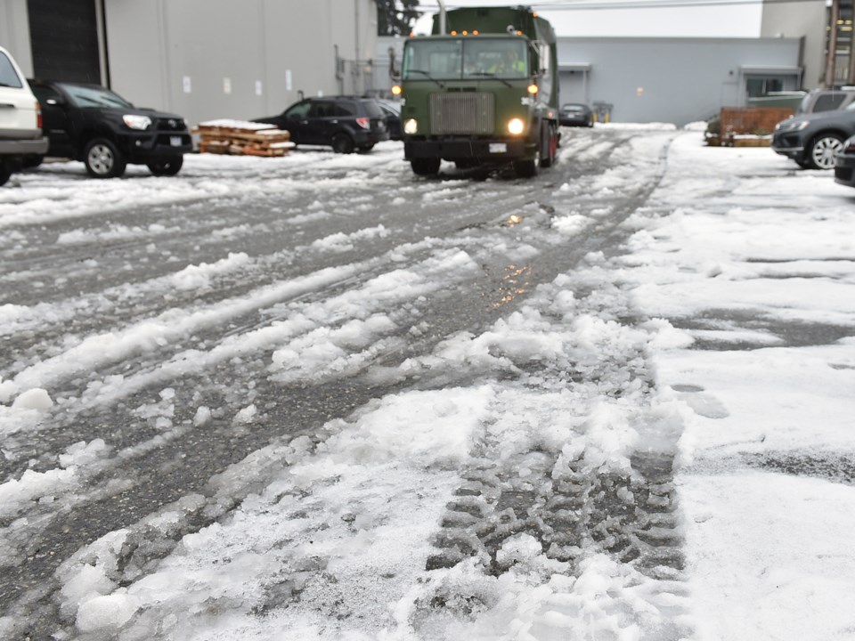 There will be slush. Warmer temperatures means plenty of melting snow on the streets. Photo Dan Toul
