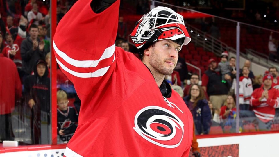 Michael Leighton waves to the crowd while with the Carolina Hurricanes.