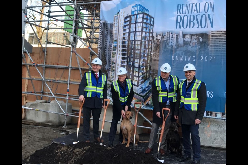 To emphasize that the new highrise being built at 1500 Robson St. will be pet friendly, two dogs — Hazel and Trink — made an appearance at the Feb. 20 ground breaking. They're pictured with (left to right) Mayor Kennedy Stewart, as well as Ralf Dost, Steve Marino and Jeff Fleming from GWL Realty Advisors.