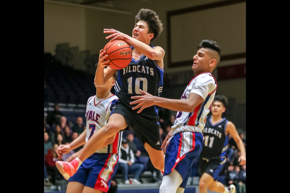 Michael Kitka soars to the basket in McMath's quarter-final win over Yale on Sunday at the BC Junior Boys Basketball Championships at the Langley Events Centre.