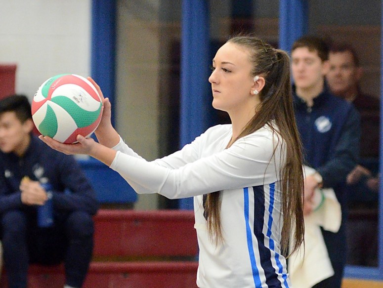 Capilano's Meghan Coven eyes up a serve during a recent PacWest match. photo Paul McGrath, North Shore News