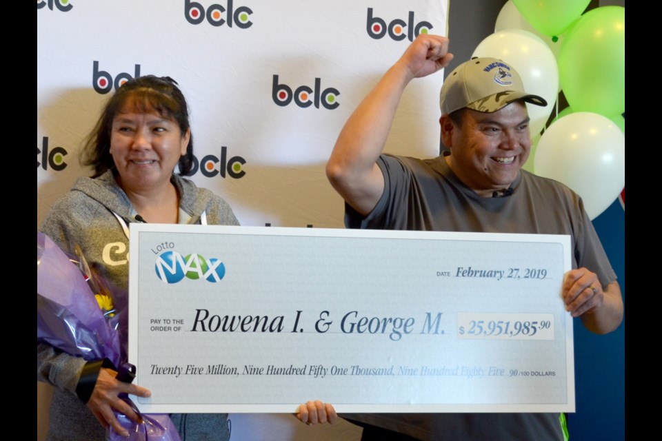 Rowena Inyallie and George Munro celebrate their big win during a visit to the BCLC headquarters in Kamloops on Wednesday, Feb. 27, to collect their $25.9-million prize. Their quick pick ticket matched all seven numbers in the Feb. 22 Lotto Max draw.