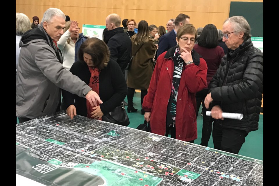 Jericho Lands open house attendees examine a map of the site. Photo Naoibh O'Connor