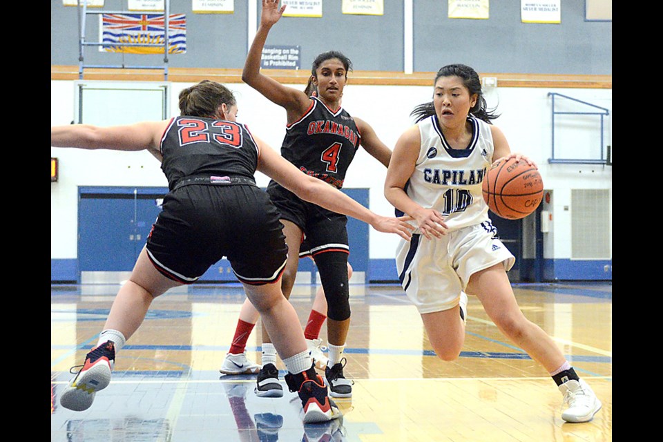 Reiko Ohama of the Capilano Blues drives to the hoop during a recent game. The Blues won silver at last weekend's PacWest championships. photo Paul McGrath, North Shore News