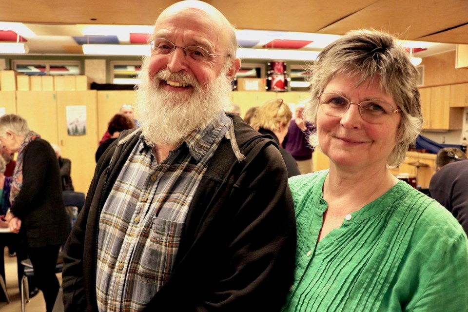 Composer and writer Brian Hoover poses with conductor Alison Nixon during a rehearsal break.