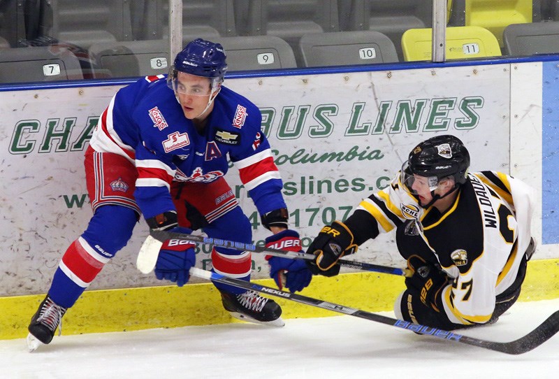 MARIO BARTEL/THE TRI-CITY NEWS
Coquitlam Express forward Joshua Wildauer is dumped to the ice by a Prince George defender in the first period of their BCHL playoff game, Tuesday at the Poirier Sports and Leisure Complex.