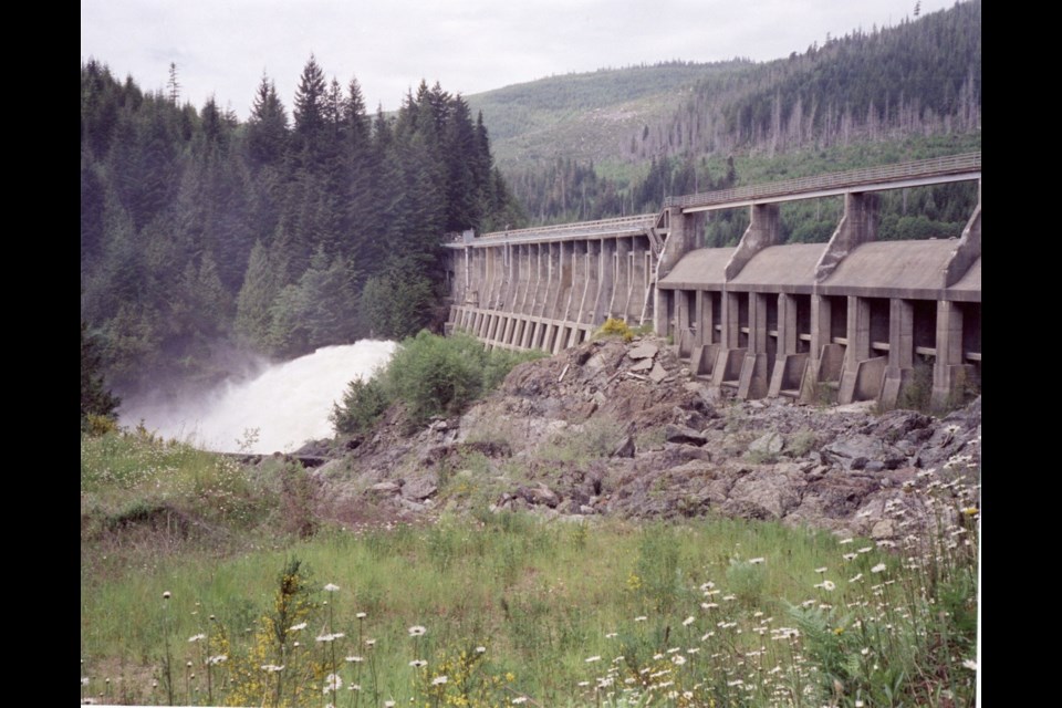 Outflow spills into the Jordan River from the Elliot Dam and the power-generation plant.