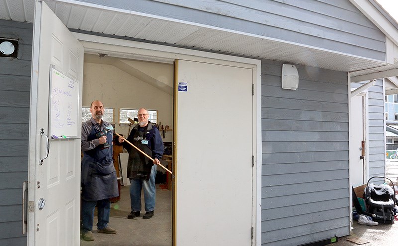 Mike Jennings, left, and Doug Gale, spend some quality time working on handyman projects in the Coquitlam Men's Shed, that is based on an Australian concept for promoting men's mental health by giving them a place to gather, share experiences and learn from each other.