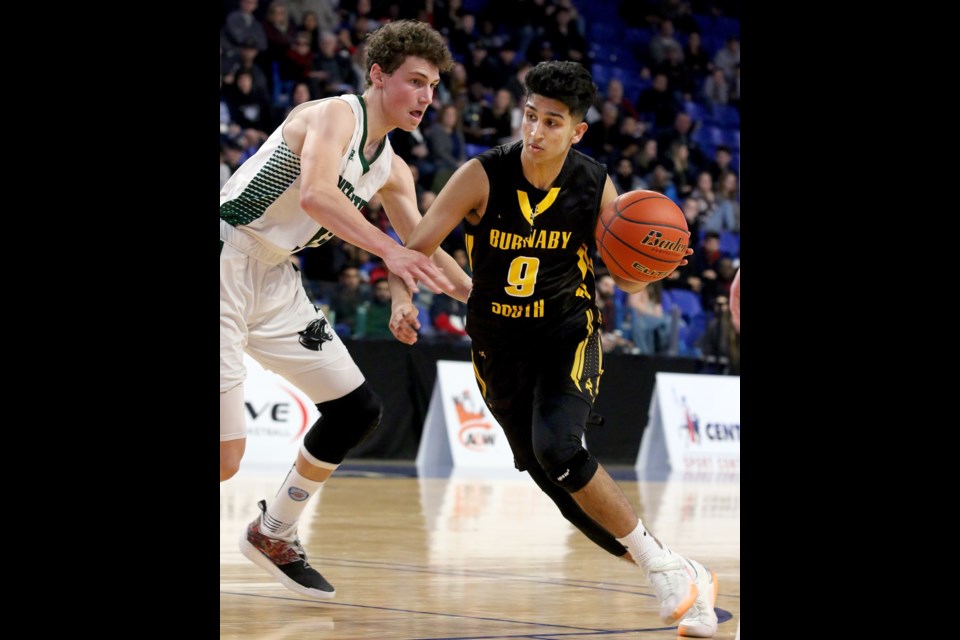 Burnaby South's Baltej Sohal goes on the attack during Friday's semifinal game against Lord Tweedsmuir at the B.C. 4-A senior boys basketball championships at the Langley Events Centre.