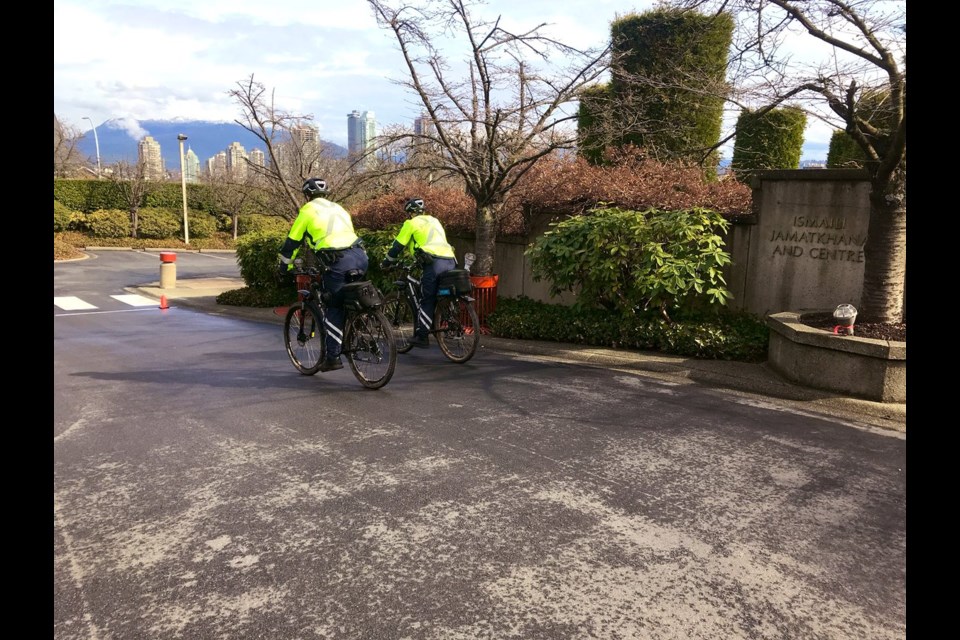 Burnaby RCMP bike patrol members patrol a local mosque after a mass shooting at two mosques in Christchurch, New Zealand Friday morning.