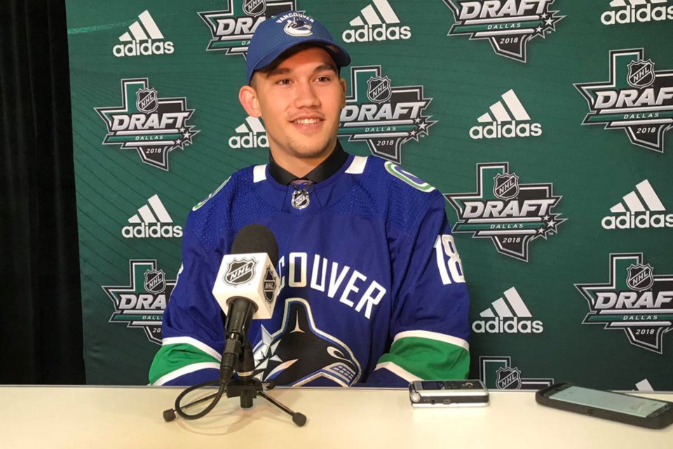 Jett Woo talks to the media after he was drafted at the 2018 NHL Draft.