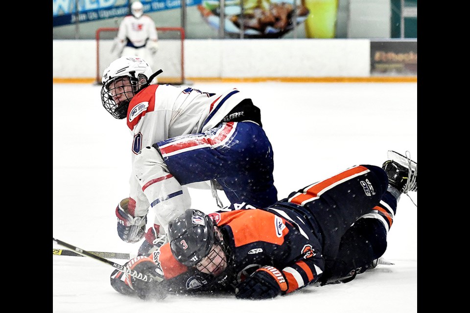 Port Moody's Christian Lowe gets the advantage for his Vancouver Northeast Chiefs in a recent B.C. Major Midget Hockey League game against the Thompson Blazers. Lowe and had Chiefs will be in Prince George this weekend for their best-of-three semifinal series against the Cariboo Cougars.