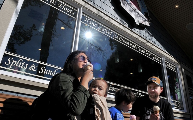 The Bradbeer family, Grace, Dylan, Adam and Jordan, enjoy a treat at Rocky Point Ice Cream on Monday.