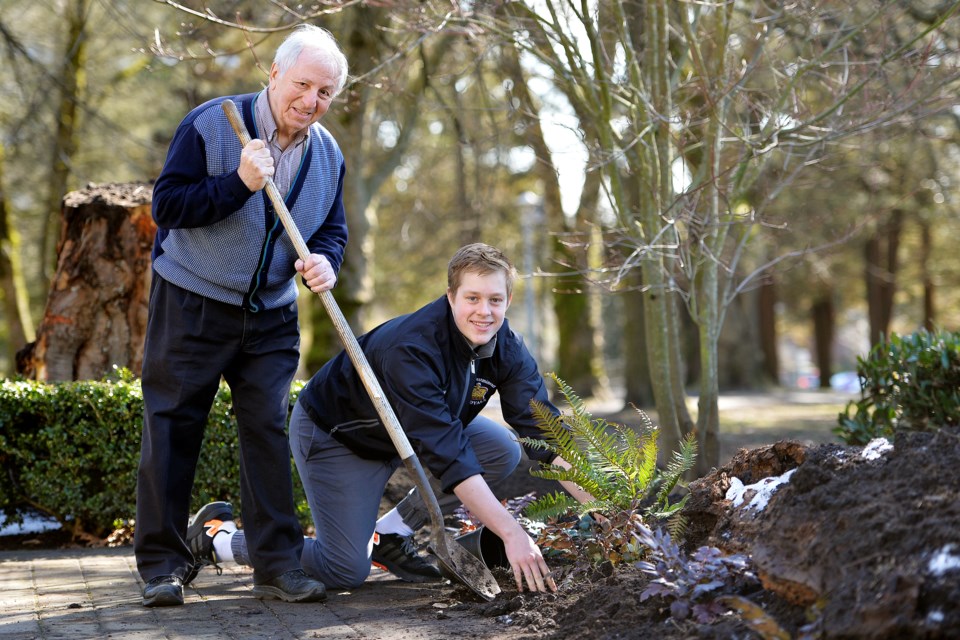 John Schemer, left, and Coburn Connelly took part in Backyard Bird and MiniBeasts, an inter-generational event that included speakers teaching folks about local flora and fauna, building chickadee next boxes and creating gardens for insects.