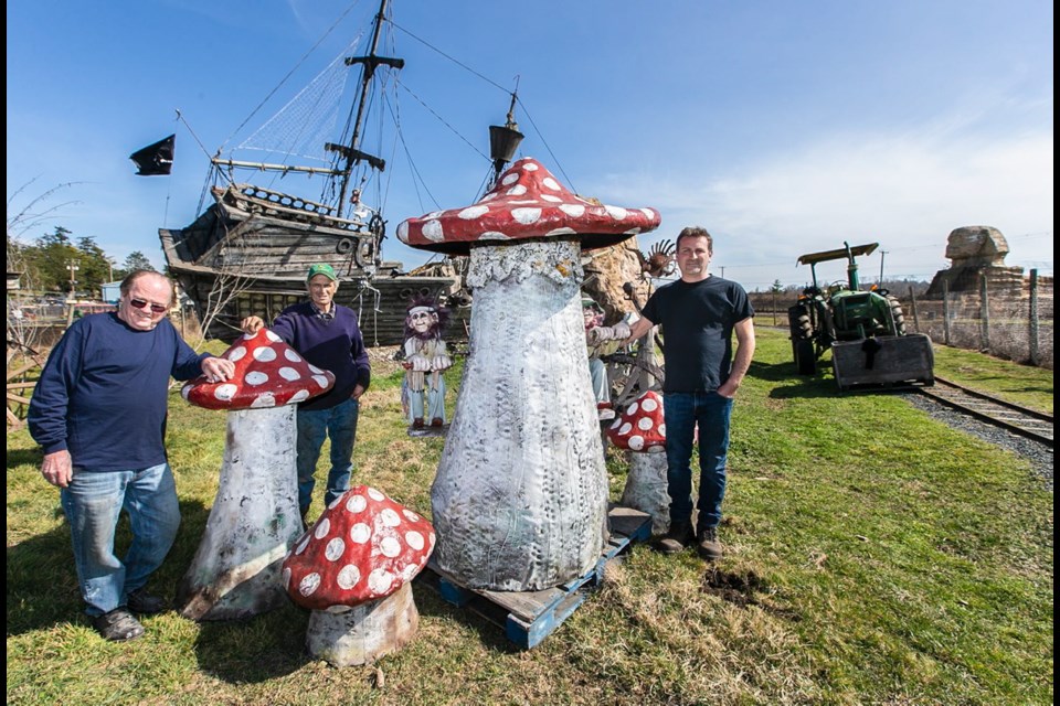 Dave Gray, left, Ray Galey and Rob Galey at the spot at Galey Farms where they would like to put Howard the Gnome.