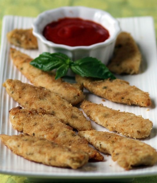 Chicken strips coated in breadcrumbs, Italian herbs and grated cheese make an easy supper.