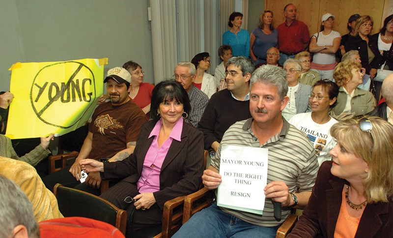 Protesters call for the resignation of former Port Coquitlam mayor Scott Young when he faced a number of criminal charges in 2007.