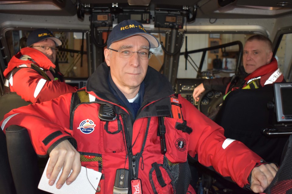 RCMSAR coxswain Mike Janicki (centre) on board the B.R. Hastings rescue vessel, with crew members Dave Ralston (right) and Aaron Harnden. Alan Campbell photos