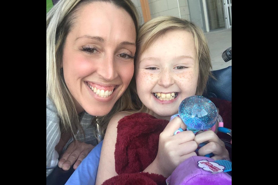 Hannah Day, 9, and her mother Brooke Ervin. Hannah was flown to B.C. Children’s Hospital in Vancouver and on Monday underwent a biopsy after tumours were found in her brain and spine.