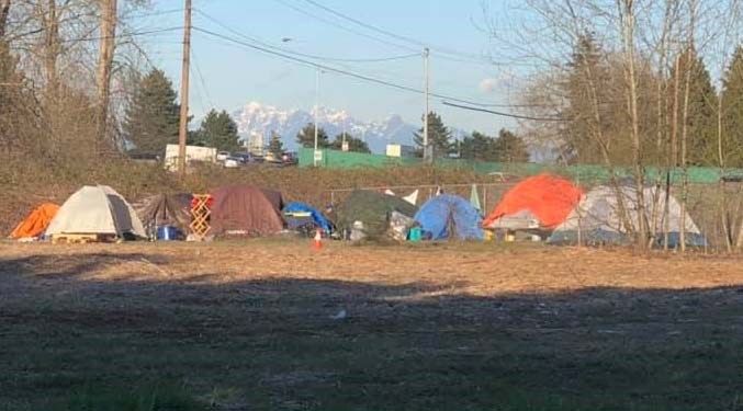 This tented village at a major intersection in Hamilton is causing concern for local residents. Facebook photo