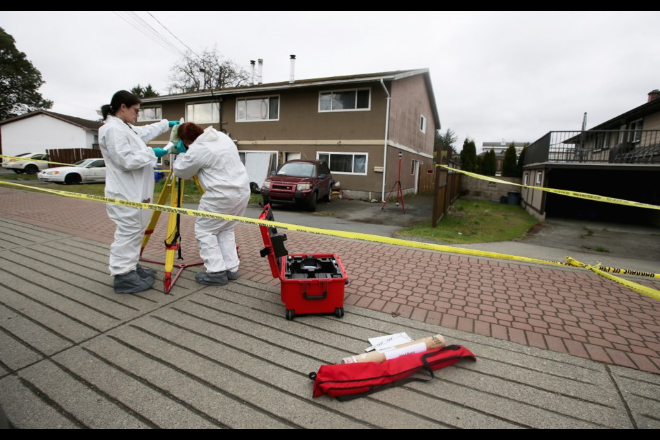 West Shore RCMP investigate the scene of a shooting on Jacklin Road near Bray Avenue in Langford on Friday, April 5, 2019.