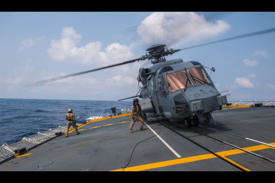 HMCS REGINA's Air Detachment trains on vertical replenishment and hoisting with the CH-148 helicopter Bronco.