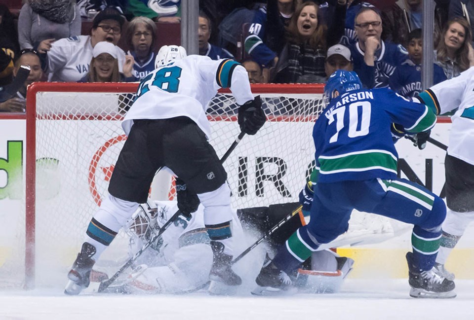 Tanner Pearson gets to the front of the net for a scoring chance for the Canucks against the Sharks.