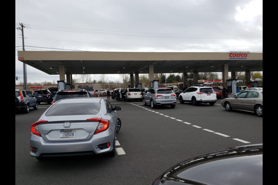 Cars lined up at Bellingham's Costco on Saturday afternoon seeking cheaper gas after Metro Vancouver pumps crept towards record high prices. Photo: Joyce Ang