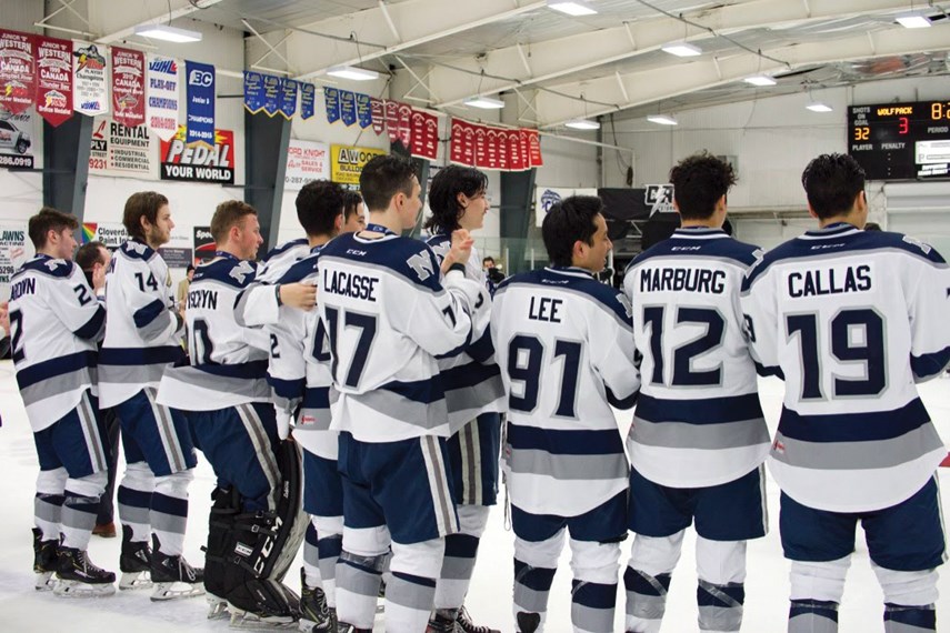 Wolf Pack players enjoy the post-game festivities following the overtime win in the bronze medal game at the Cyclone Taylor Cup. photo supplied, Jerome Marburg