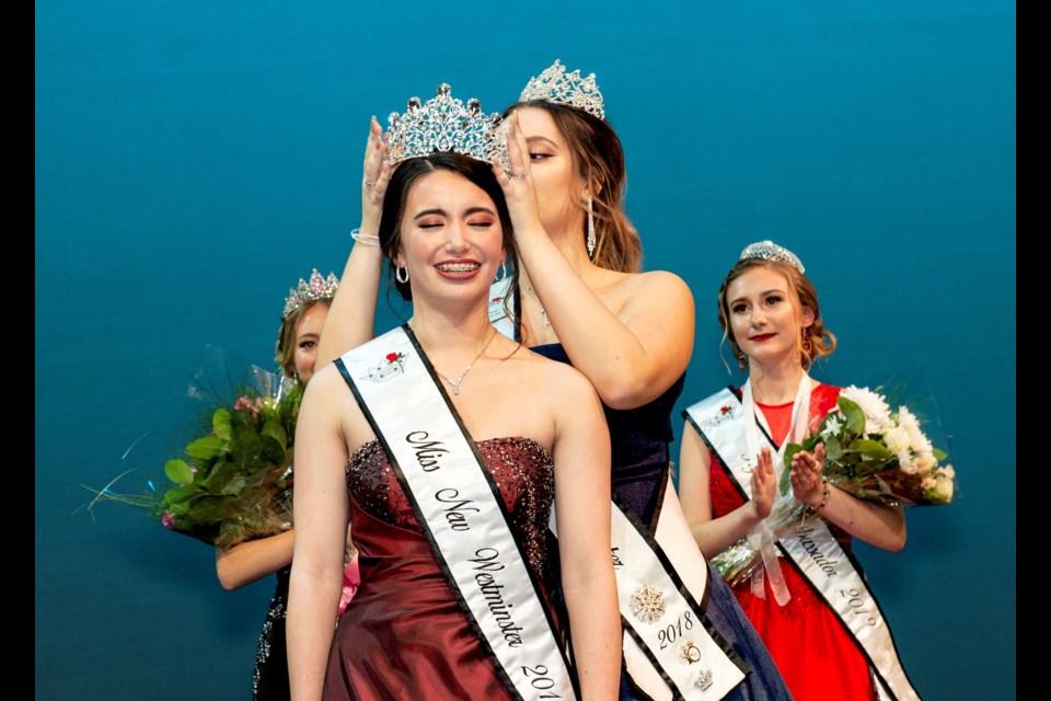 Natasha Sing receives her Miss New Westminster 2019 sash and tiara from retiring Miss New Westminster, Talia Monno.