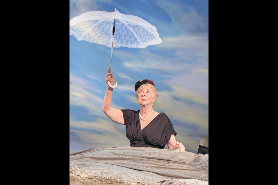 Donna Belleville as Winnie in Happy Days, Samuel Beckett's absurdist tragicomedy exploring happiness and the meaning of life. The Blue Bridge Repertory Theatre production runs through May 5 at the Roxy Theatre.