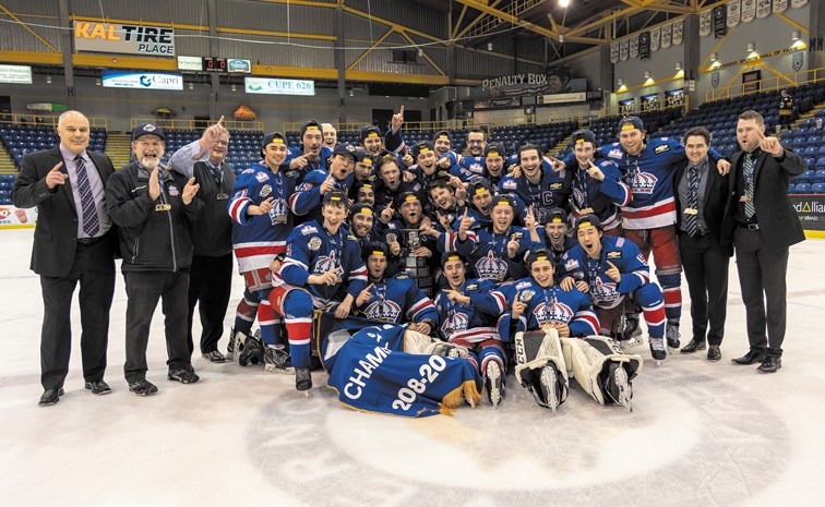 The Spruce Kings celebrate their 3-1 victory over the Vernon Vipers Wednesday in Vernon which clinched their first Fred Page Cup as champions of the B.C. Hockey League.
