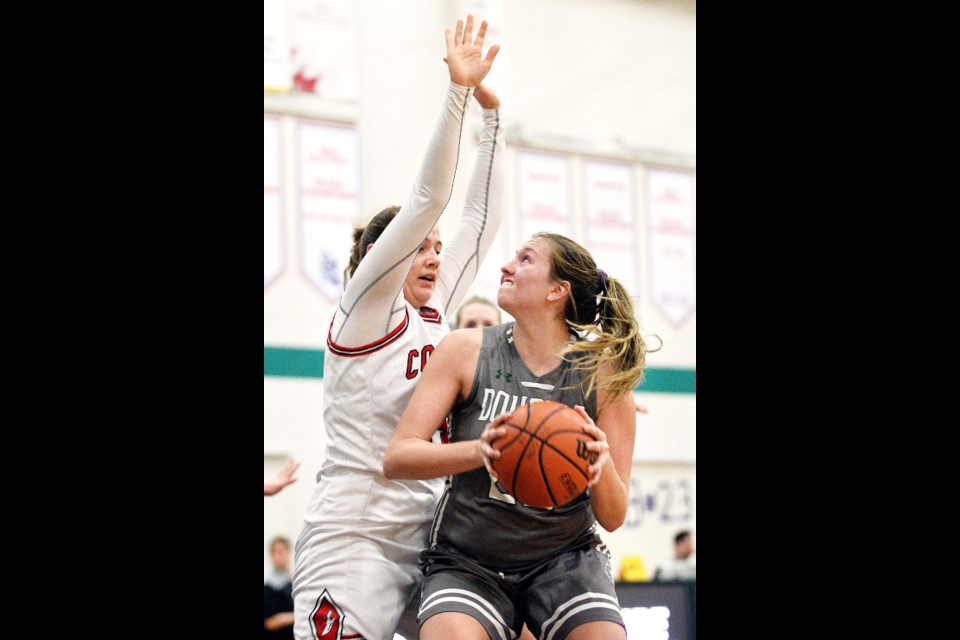 Douglas College's Rachel Beauchamp, at right, waits for an opening during a game earlier this year. The fifth-year Royal was among three players from Douglas to receive a CCAA Academic All-Canadian honour.