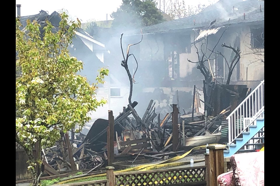 This Burnaby home in the 3700 block of Pender was gutted by fire early Friday morning. CHRIS CAMPBELL PHOTO