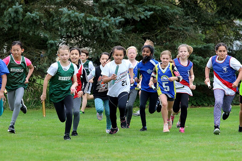 MARIO BARTEL/THE TRI-CITY NEWS And they're off, in the girls Grade 4 race at last Wednesday's opening day of the Como Lake Relays.